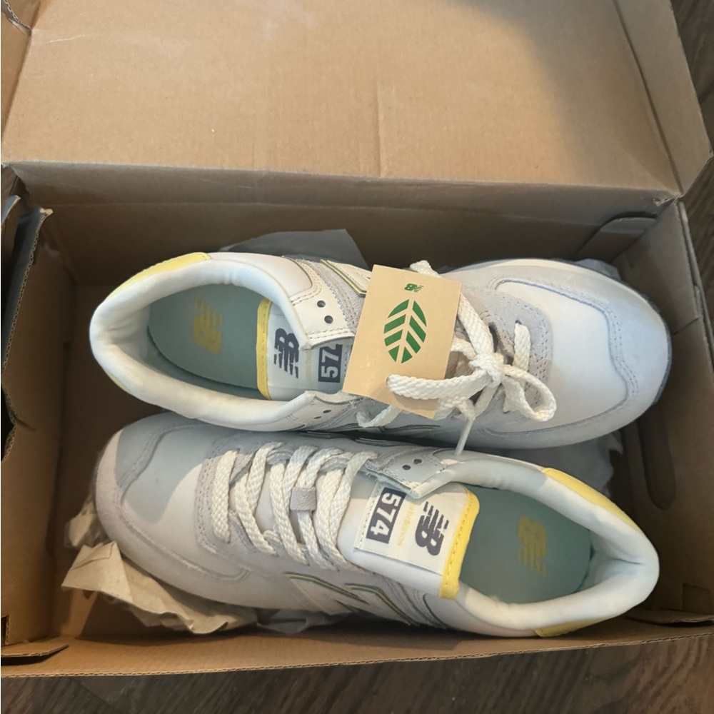 New Balance Grey Shoes With Yellow and Blue Colors